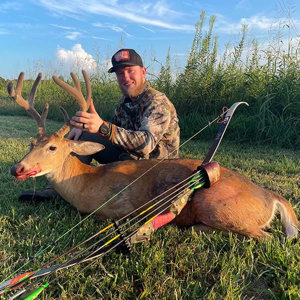 Dylan Ray posing with Whitetail buck