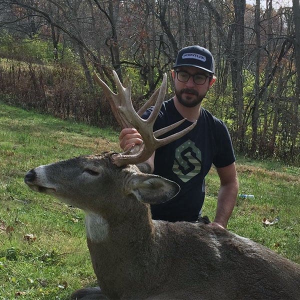 Woman bowhunting