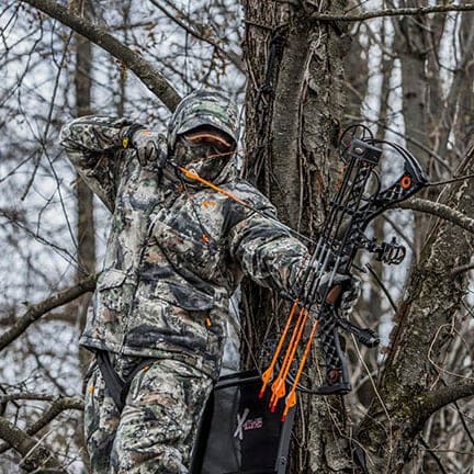 Odor Management In and Out of the Woods with guy drawing bow